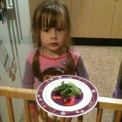 When I got up, Hannah was in the kitchen making me birthday breakfast all by herself.  Grapes and wilted lettuce. It was a sweet gesture at least.
